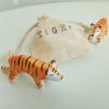 figurine tigre et son emballage pochon en coton